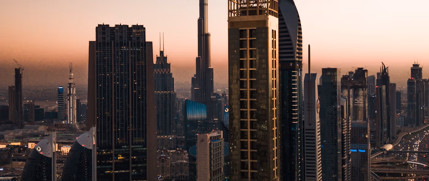 The Dubai skyline with the Burj Khalifa at dusk.