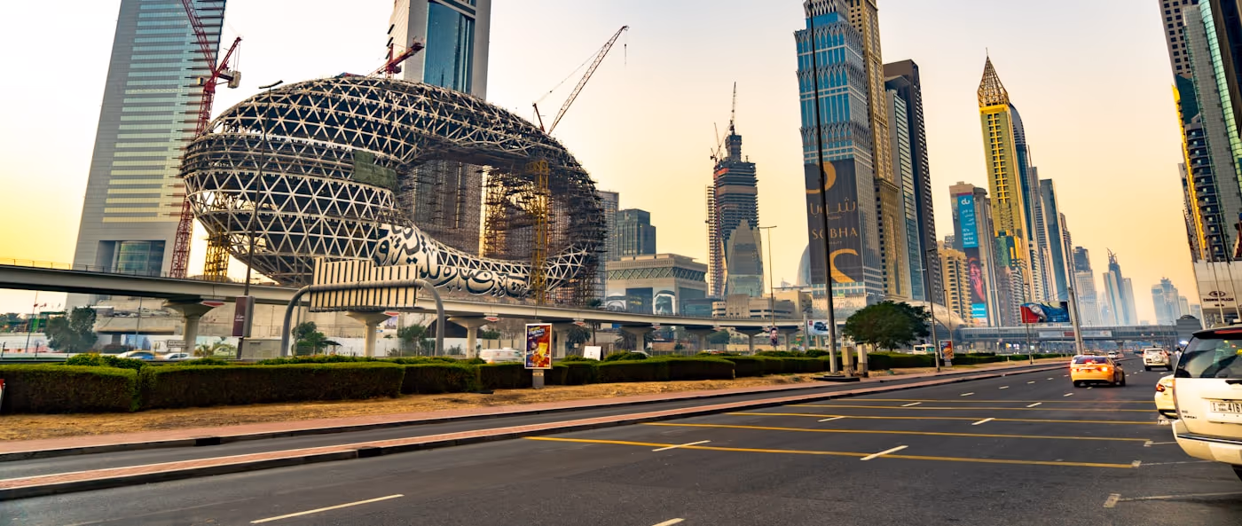 A Dubai street beneath the city skyline.